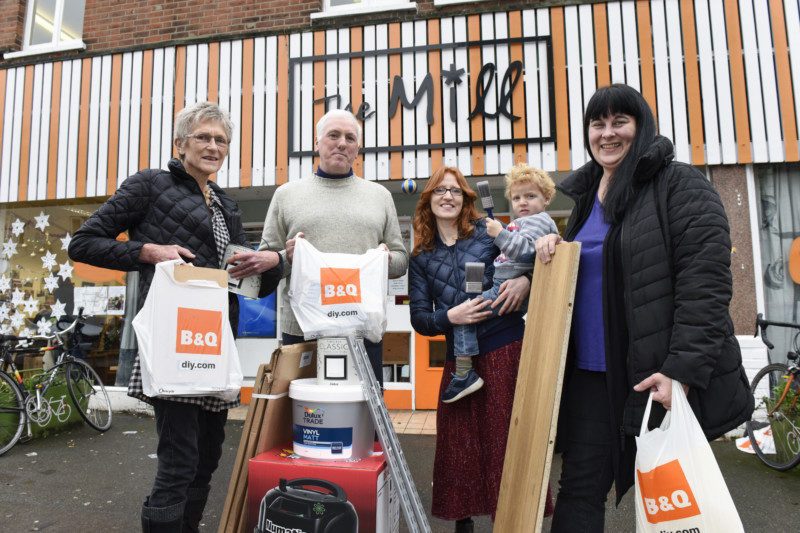 Mill volunteers with staff from B&Q