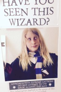 Child with have you seen this wizard sign