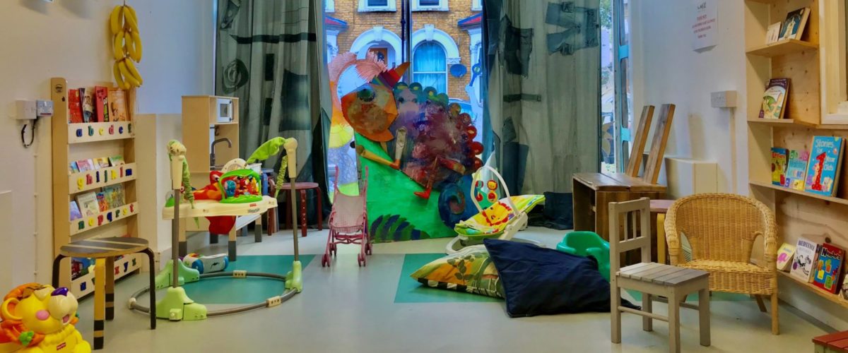 The Mill Children's Room, with a selection of toys and books laid out, ready for play.