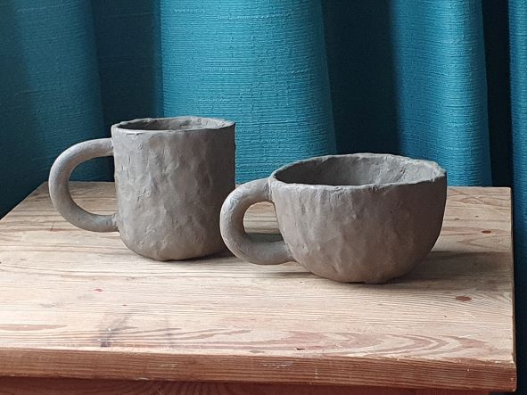 Make a small clay bowl, or mug